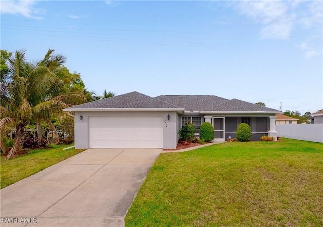 ranch-style house featuring a garage, fence, driveway, stucco siding, and a front yard