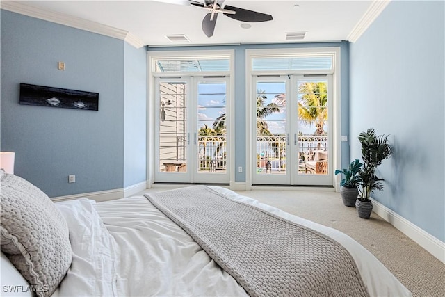 carpeted bedroom featuring ornamental molding, access to outside, french doors, and visible vents