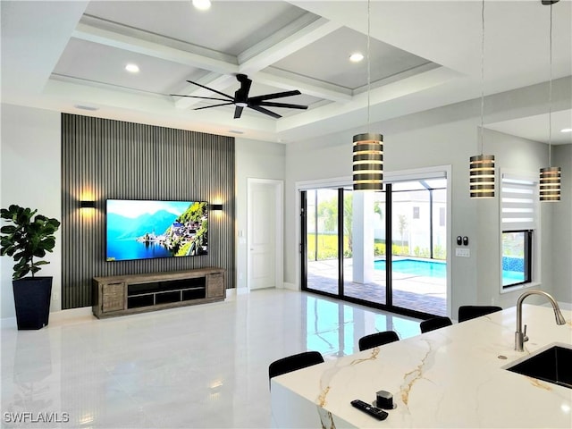 interior space with marble finish floor, recessed lighting, a towering ceiling, a ceiling fan, and coffered ceiling