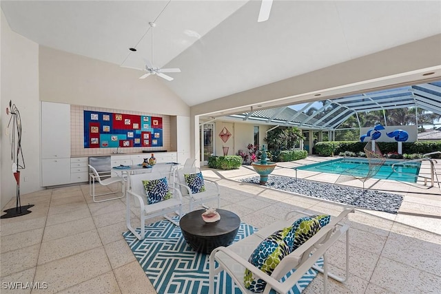 interior space featuring a lanai, an outdoor pool, and ceiling fan