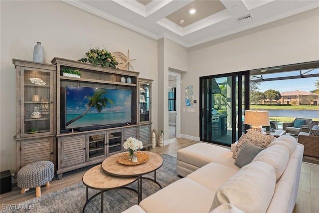 living room with coffered ceiling, visible vents, and wood finished floors