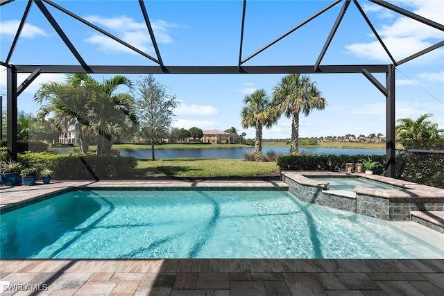 view of swimming pool featuring glass enclosure, a water view, and a pool with connected hot tub