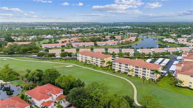 bird's eye view with a water view and golf course view