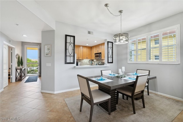 dining area with recessed lighting, visible vents, baseboards, and light tile patterned flooring