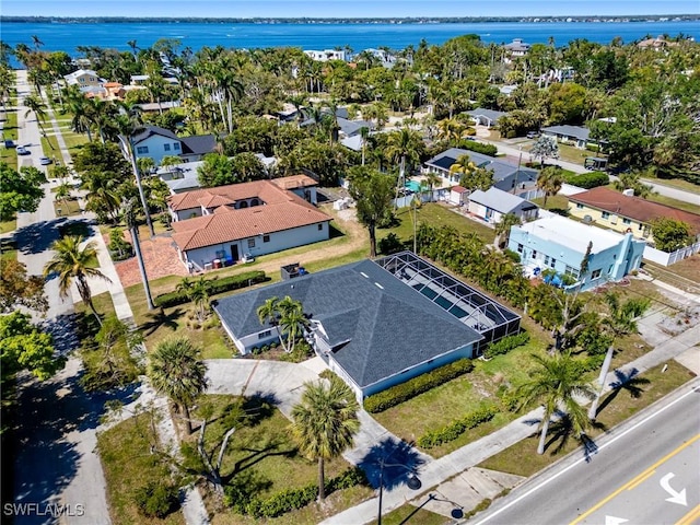 aerial view with a residential view and a water view