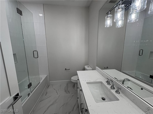 bathroom with baseboards, toilet, enclosed tub / shower combo, marble finish floor, and vanity