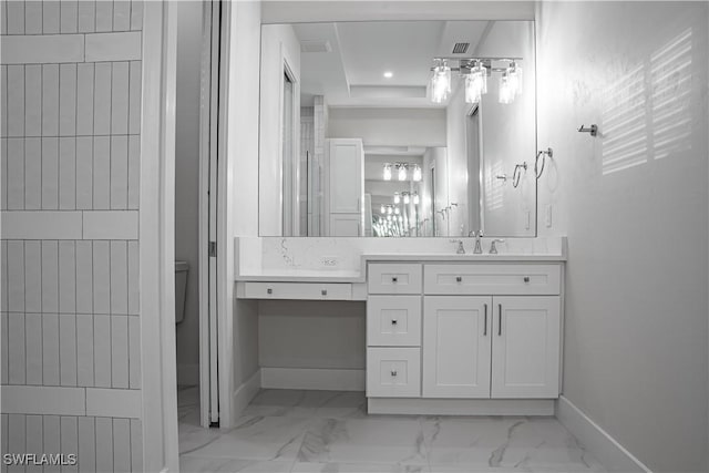 bathroom featuring recessed lighting, marble finish floor, vanity, and baseboards