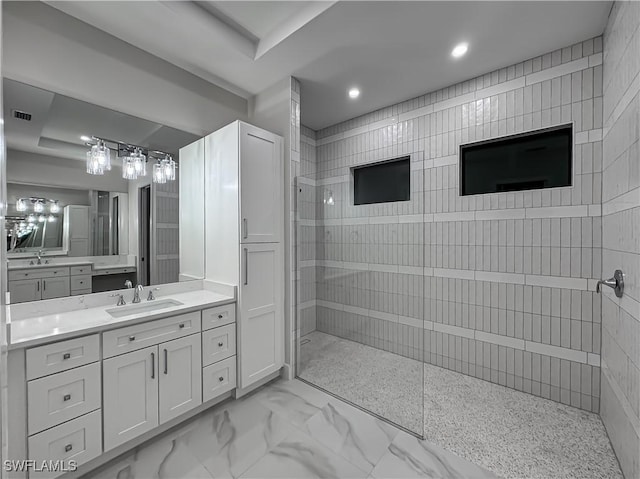 full bath with marble finish floor, recessed lighting, visible vents, vanity, and walk in shower