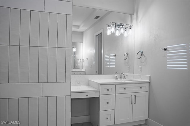 bathroom featuring visible vents and vanity