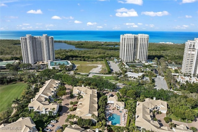 bird's eye view featuring a water view and a city view