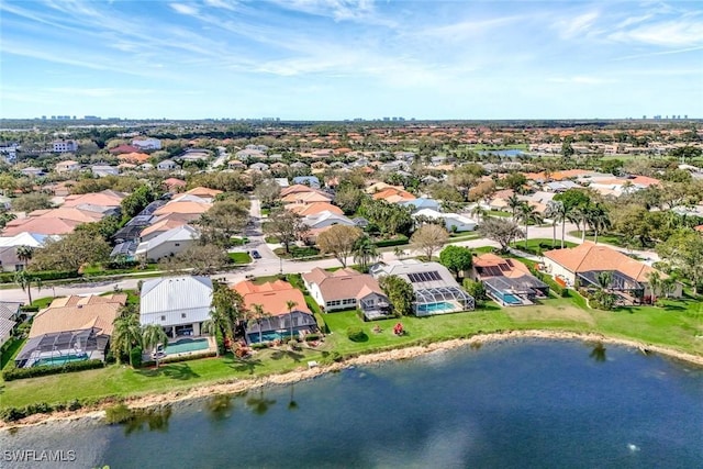 aerial view featuring a residential view and a water view