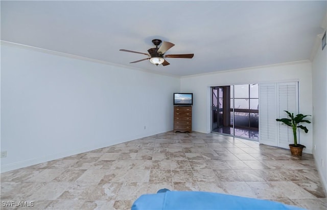 empty room with a ceiling fan and crown molding