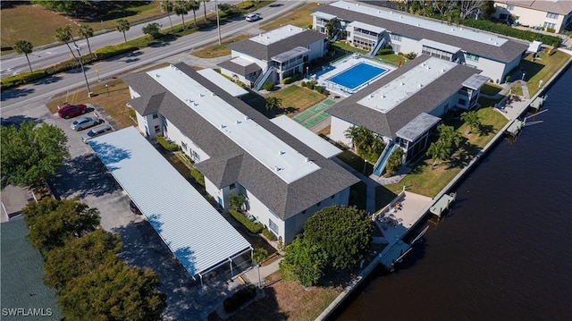view of subject property featuring a pool area