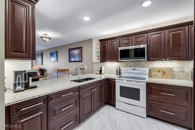 kitchen featuring a sink, marble finish floor, white range with electric stovetop, tasteful backsplash, and stainless steel microwave