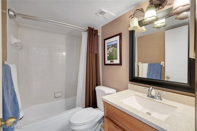 bathroom featuring shower / bath combo, visible vents, vanity, and toilet