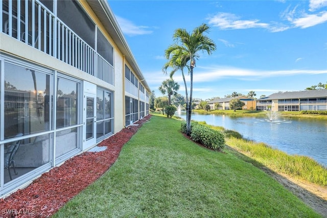 view of yard featuring a water view