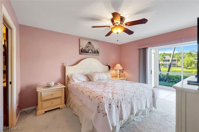 bedroom featuring access to exterior, light carpet, and ceiling fan