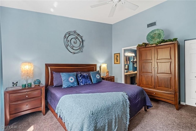 bedroom featuring carpet, visible vents, a ceiling fan, and ensuite bathroom