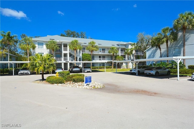 view of property with covered parking