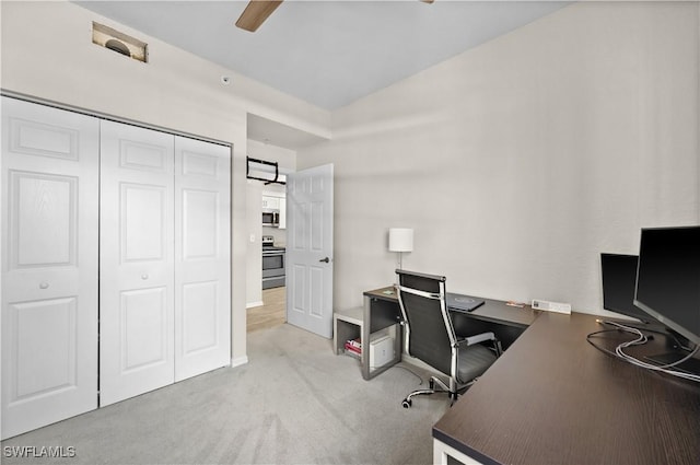 home office featuring carpet and ceiling fan