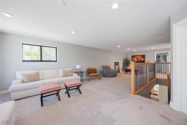 living room featuring baseboards, carpet floors, and recessed lighting