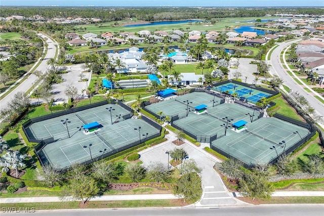 bird's eye view with a water view and a residential view