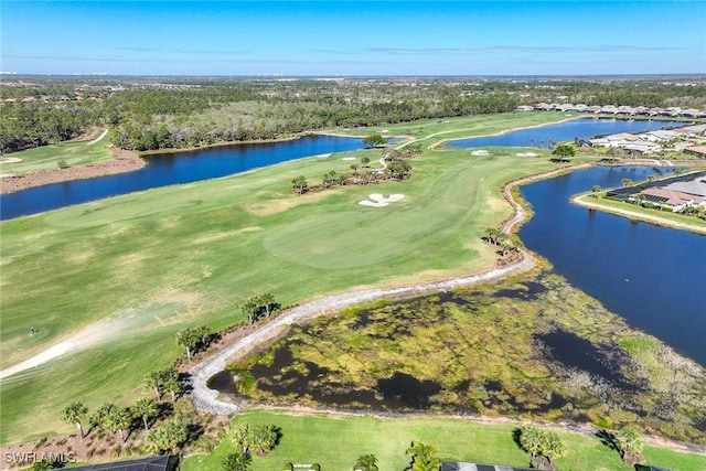 bird's eye view with a water view and view of golf course