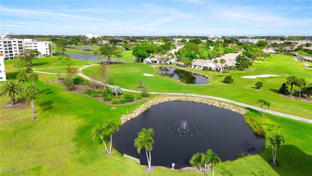 drone / aerial view featuring a water view and golf course view