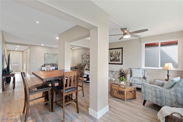 dining area with ceiling fan, recessed lighting, light wood-type flooring, and baseboards