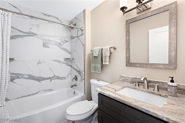 bathroom featuring  shower combination, vanity, and toilet