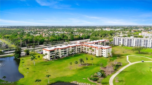 birds eye view of property featuring a water view and view of golf course