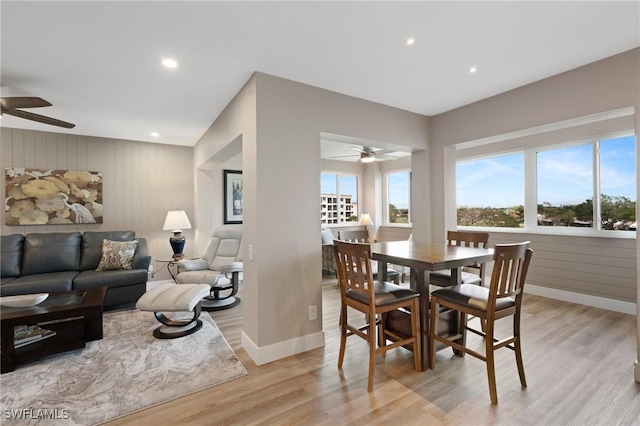 dining space with light wood finished floors, ceiling fan, baseboards, and recessed lighting