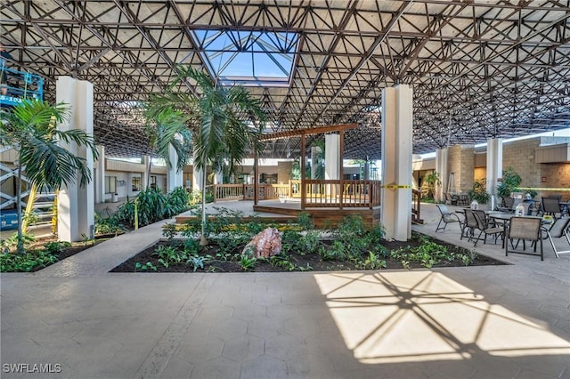 view of property's community with a patio area and a pergola