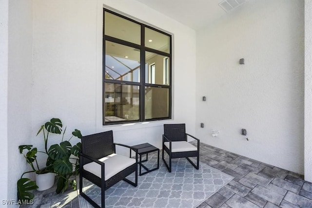 view of patio featuring visible vents