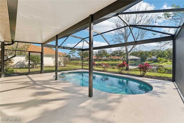 pool with a lanai and a patio