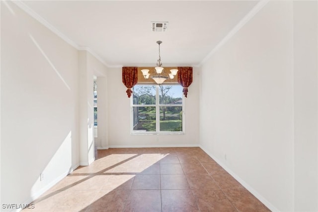 unfurnished dining area featuring baseboards, tile patterned flooring, a chandelier, and crown molding