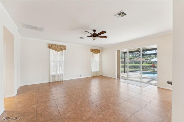 unfurnished room with light tile patterned floors, visible vents, crown molding, and ceiling fan