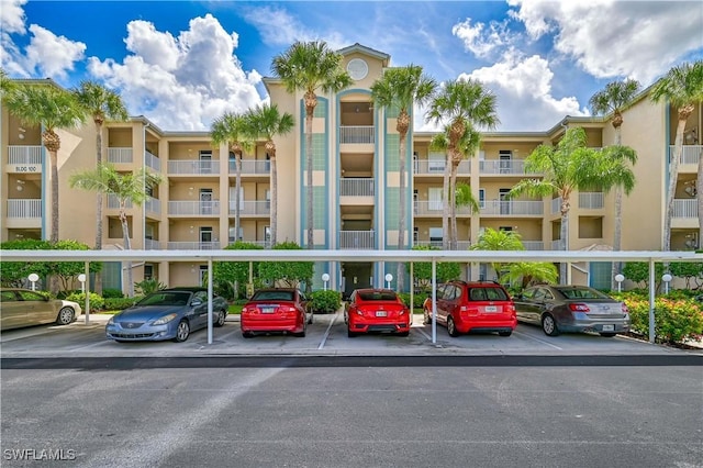 view of property with covered parking