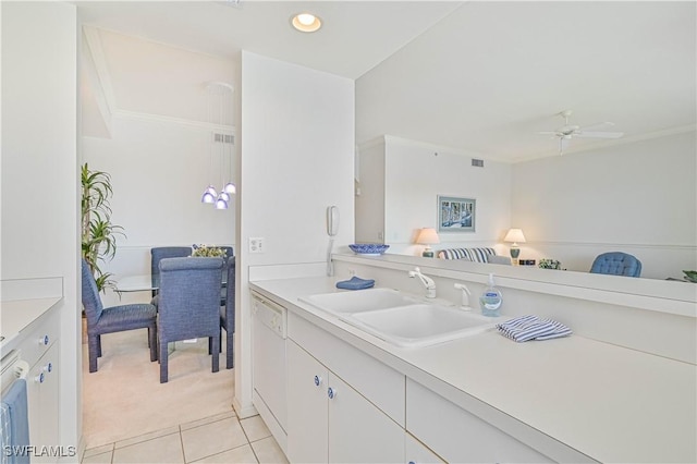 kitchen featuring a sink, white cabinetry, a ceiling fan, light countertops, and dishwasher