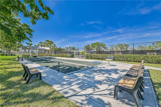 surrounding community featuring a yard and fence