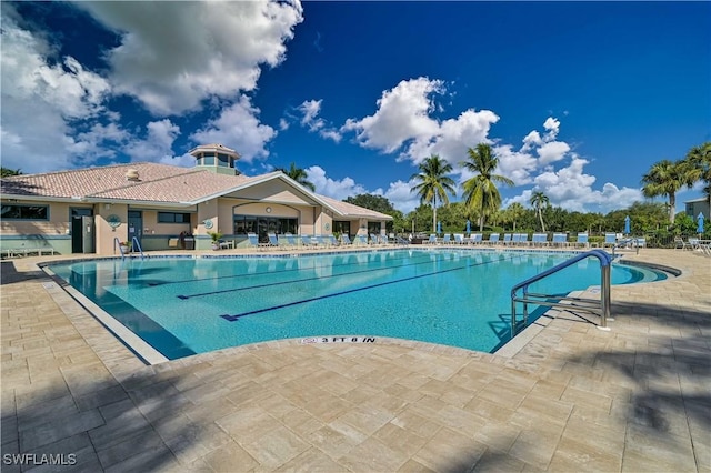 pool with a patio