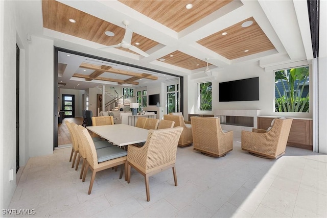 dining area featuring plenty of natural light, stairway, coffered ceiling, and wooden ceiling