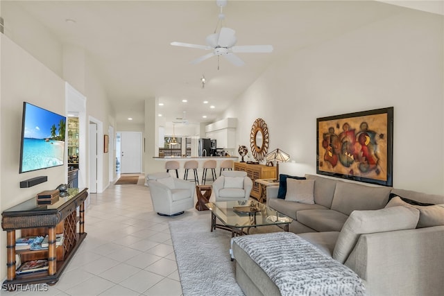 living area featuring recessed lighting, ceiling fan, high vaulted ceiling, and light tile patterned flooring