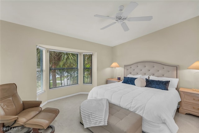 bedroom with carpet floors, baseboards, and a ceiling fan