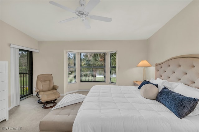 bedroom featuring access to outside, carpet flooring, ceiling fan, and multiple windows