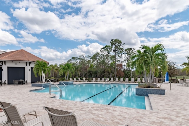 pool featuring a patio area