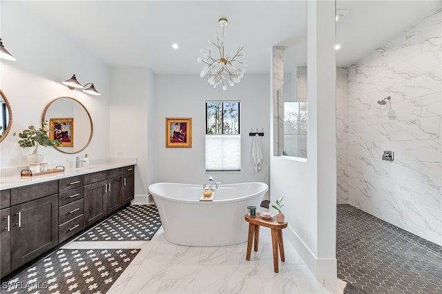 bathroom featuring a walk in shower, vanity, baseboards, a freestanding bath, and marble finish floor