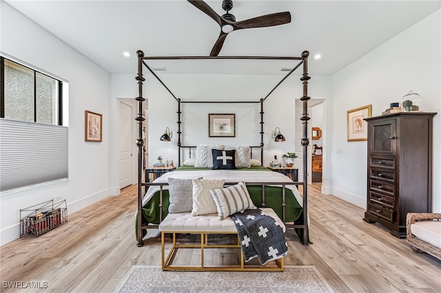 bedroom featuring recessed lighting, light wood-style flooring, and baseboards