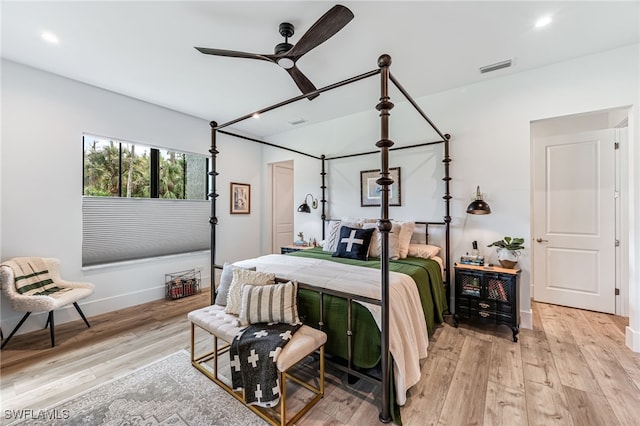 bedroom featuring recessed lighting, baseboards, visible vents, and light wood finished floors