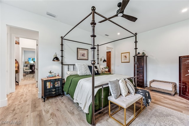 bedroom featuring recessed lighting, visible vents, and light wood finished floors